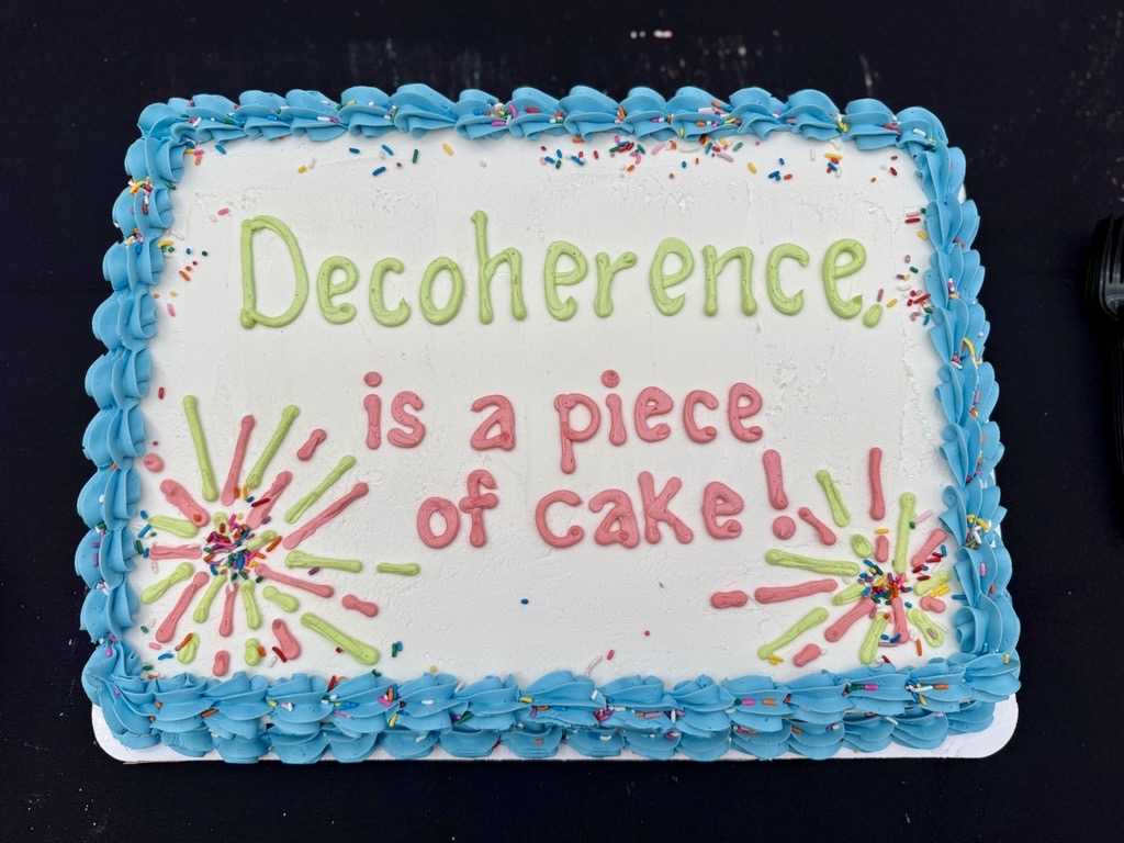 One memorable cake-based moment claiming that "decoherence is a piece of cake," humorously implying that QEC helps overcome this fundamental quantum challenge. 